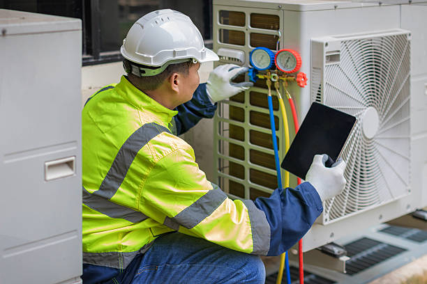 Professional Heat Pump Repair technician working in Chevy Chase, MD